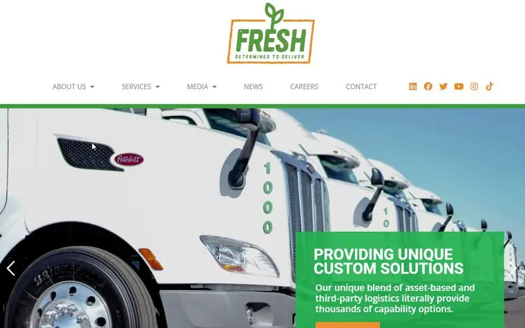Fresh Freight homepage: logo, navigation and a large photo of a refrigerated truck with a custom-solutions panel over it